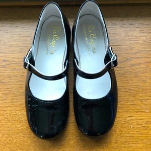 Black patent leather shoes.